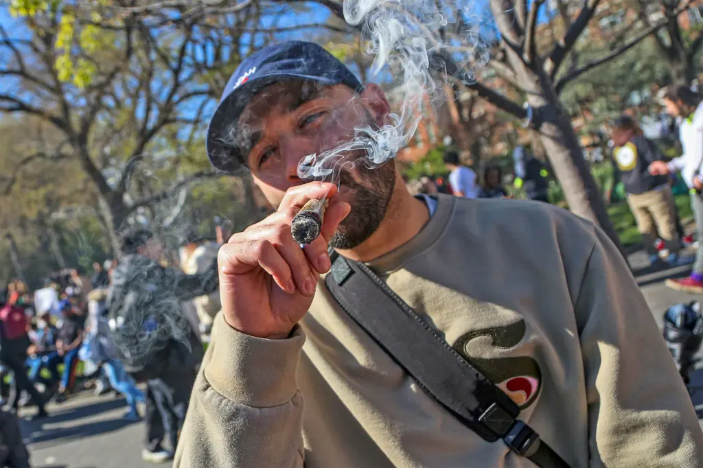 a man smokes a cigarette